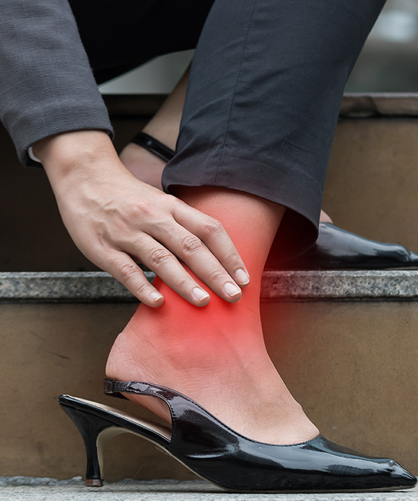 Image of a woman with ankle pain